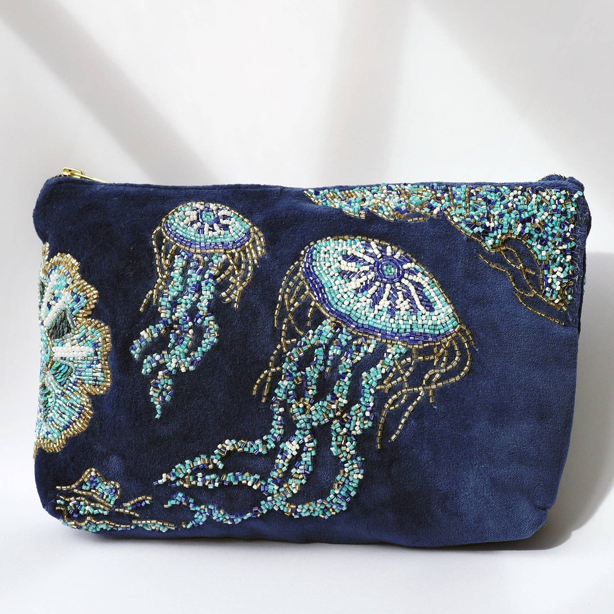 Navy velvet pouch bag with beaded jellyfish by Cream Cornwall