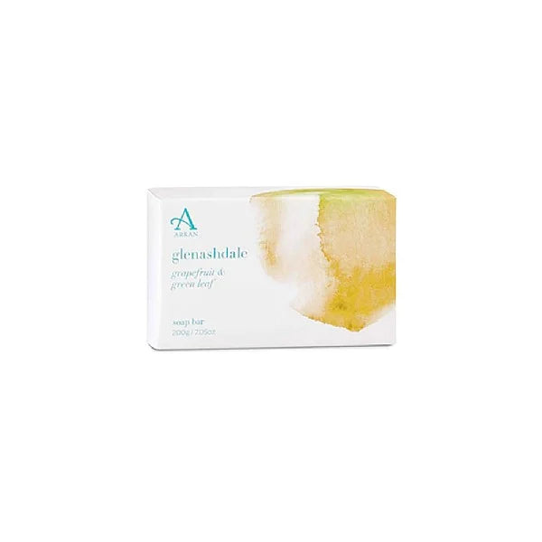 A rectangular package for the Glenashdale Soap Bar, adorned with a watercolor design in yellow and green, features "glenashdale" in white text. It highlights the grapefruit and green leaf scent and contains a bar weighing 200g or 7.0oz.