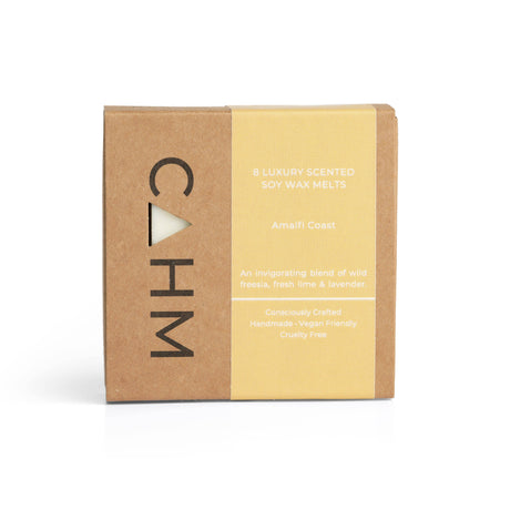 The "Amalfi Coast" luxury soy wax melts from CAHM, in a brown and yellow gift box, combine wild freesia, fresh lime, and lavender for an invigorating aroma. Handmade, vegan-friendly, cruelty-free, and hand-poured for a luxurious experience.