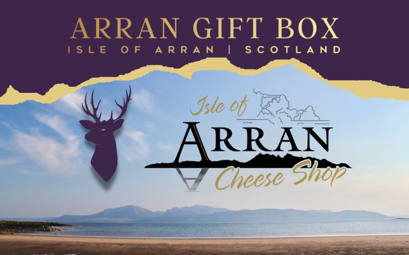 Illustration of the Isle of Arran Cheese Shop logo with a stag silhouette on a scenic coastal background, promoting the Arran Gift Box from Isle of Arran, Scotland.