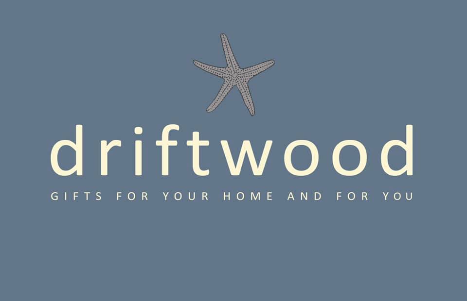 Logo with a starfish above the letter “t” in “driftwood.” Text below reads: “GIFTS FOR YOUR HOME AND FOR YOU” on a muted blue background.