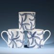 Navy starfish bone china mug, 375ml by Cream Cornwall