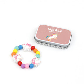 The Unicorn Bracelet Gift Kit, featuring a vibrant beaded bracelet with unicorn charms and packaged in a pink tin, makes a perfect plastic-free gift or magical party favor for unicorn lovers.