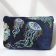 Navy velvet pouch bag with beaded jellyfish by Cream Cornwall