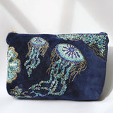 Navy velvet pouch bag with beaded jellyfish by Cream Cornwall