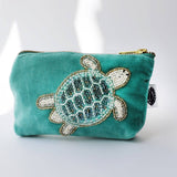 Turquoise velvet coin purse with beaded turtle by Cream Cornwall