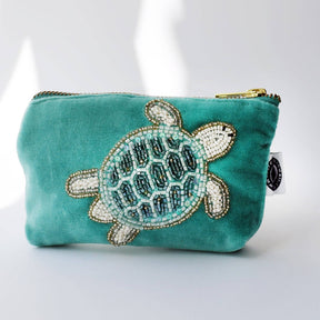 Turquoise velvet coin purse with beaded turtle by Cream Cornwall