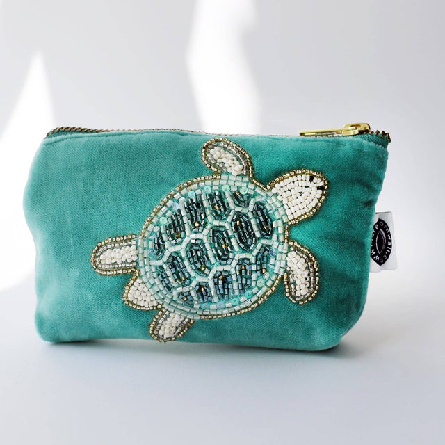 Turquoise velvet coin purse with beaded turtle by Cream Cornwall