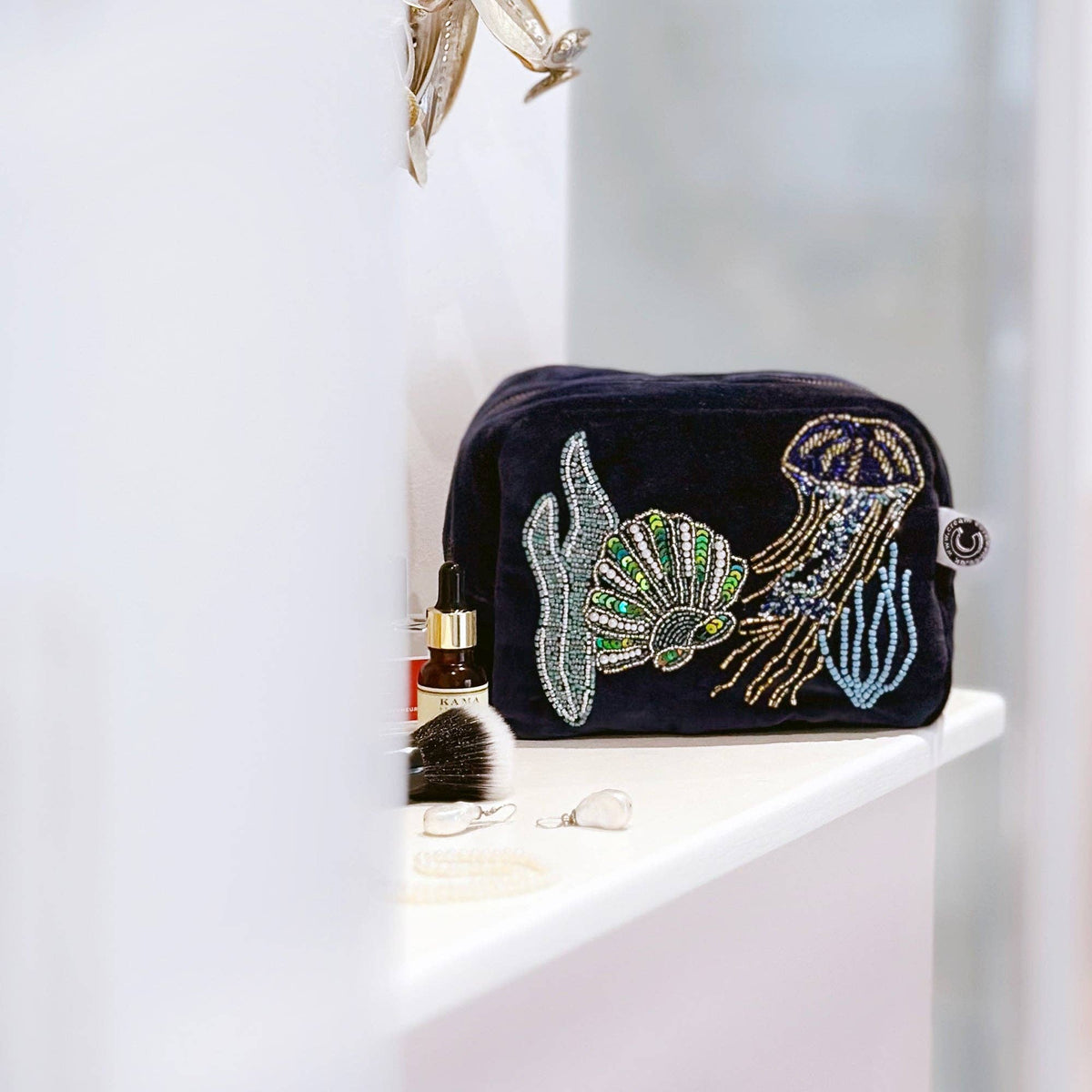 Navy velvet cosmetic bag with beaded jellyfish by Cream Cornwall – product image 3
