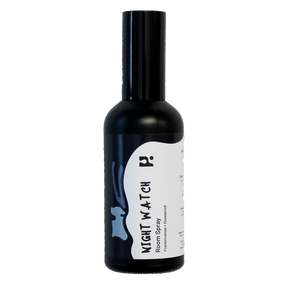 A black bottle labeled "Night Watch Aromatherapy Room Spray 100 ml" by Isle of Skye Candle Company features a minimalist white and blue design with stylized text and a crescent moon, set against a plain light background.