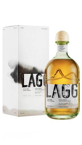 A bottle of LAGG Single Malt Kilmory Edition 70cl, aged in bourbon casks, stands next to its matching box, showcasing a light golden hue. The design features bold black lettering on both the bottle and box, complemented by artistic black brushstroke elements that enhance its finish.