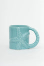 Light blue Batela Starfish Embossed Mug with an embossed design that incorporates the handle.