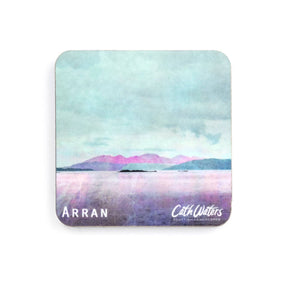A square fridge magnet made from melamine coated wood, featuring a pastel landscape of Arran with mountains, water, and sky. Signed "Cath Waters" in the lower right corner with "Arran" on the bottom left.