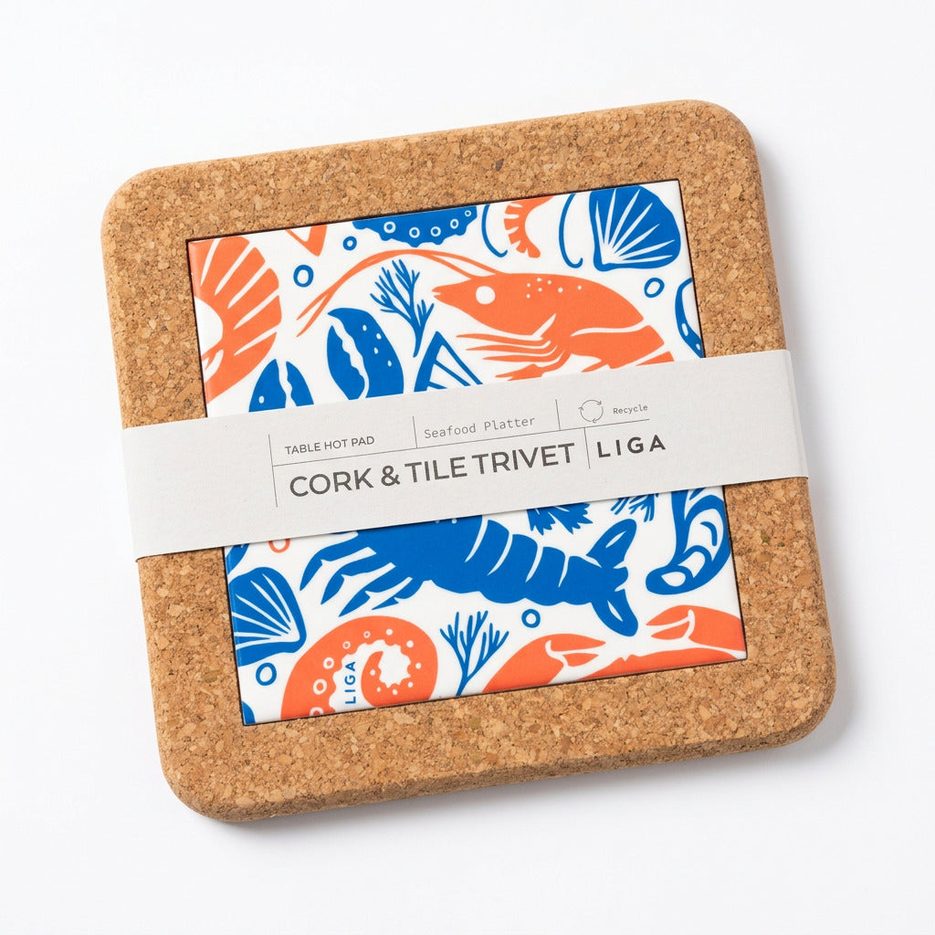 Seafood Platter Cork and Tile Trivet featuring a square cork and earthenware design with a central seafood print in blue and orange, secured with a paper band.
