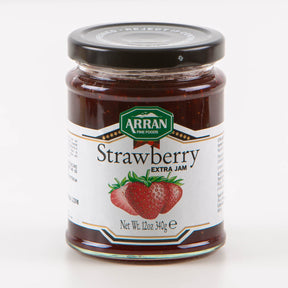 A 12oz (340g) jar of Strawberry Extra Jam from Arran Fine Foods, Isle of Arran, with a black lid, white label, and an image of three strawberries.