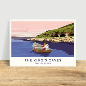 The Catriona Tod Kings Caves Print features a postcard-style illustration of a figure rowing near rocky caves on a green hillside, under a pink sky with birds, captioned "The King's Caves, Isle of Arran" below the image.