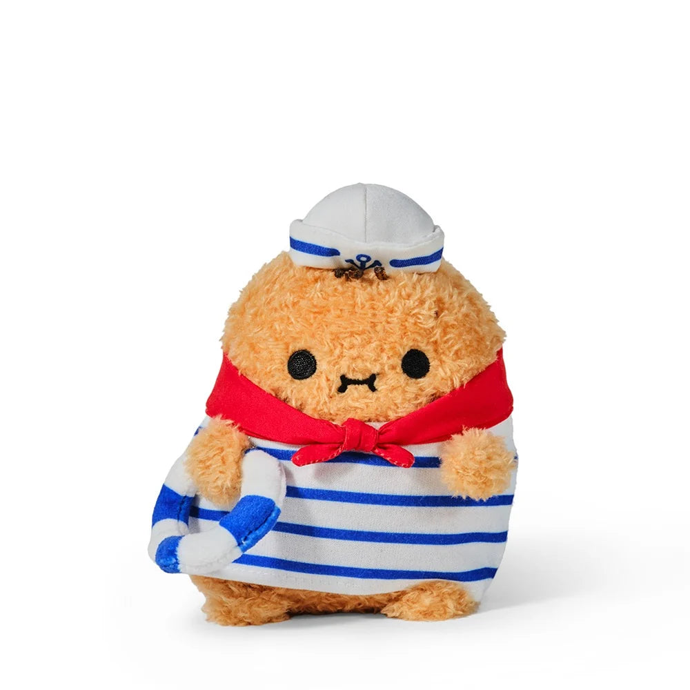 The Noodoll Ricespud Sailor is an adorable plush toy dressed in a white sailor hat, red scarf, and blue-and-white striped shirt, holding a matching life preserver. With its round, fluffy orange body and sweet expression, this nautical-themed soft toy is perfect for cuddling or adding a charming sea-inspired touch to your décor.