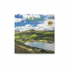 The ARRAN CALENDAR 2027 features a scenic cover of green hills, water, and a cloudy blue sky by Allan Wright. Priced at £6.99, this wall calendar includes the photographer’s signature at the bottom.