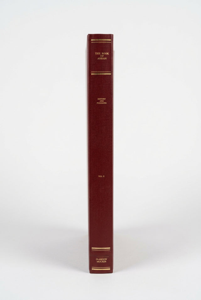 The spine of a burgundy book from The Book of Arran – Volumes 1 & 2 | Glasgow Society of Arran Reprints, featuring gold lettering that reads “The Book of Arran,” “History and Folklore,” “Vol. II,” and “Olasoon Mucker.”