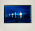 The Sailing into The Blue Ceramic Tile features four sailboats with white sails gliding on a deep blue sea, their reflections shimmering in the water beneath a dark blue sky.