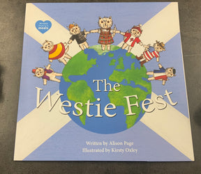 Corrie's Capers Children Books: "The Westie Fest" features cartoon Westie dogs in costumes holding hands around a globe, set against an Isle of Arran-inspired blue and white flag. Written by Alison Page, illustrated by Kirsty Oxley.