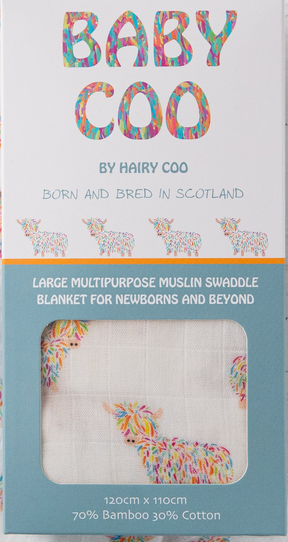 A product box labeled "Baby Coo - Highland Cow Muslin," with colorful cow illustrations, features a large bamboo muslin swaddle baby blanket—an ideal newborn gift made from 70% bamboo and 30% cotton.