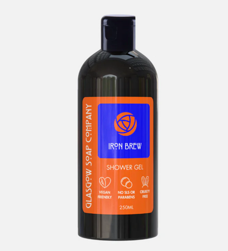 The 250ml Iron Brew Shower Gel by Glasgow Soap Company comes in a black bottle with an orange and blue label. It offers a citrus-sweet, fizzy lather, is vegan-friendly, SLS- and paraben-free, cruelty-free.