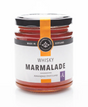 A glass jar of Whisky Marmalade with an orange label and black lid. The label reads "Made in Scotland" and "Annandale Distillery," showcasing its Scottish whisky marmalade heritage.