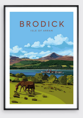 Framed poster titled "Catriona Tod Brodick Bay Portrait" depicting two horses grazing on a green field, a ferry on the bay, and mountains beneath a blue sky with clouds at Brodick, Isle of Arran.