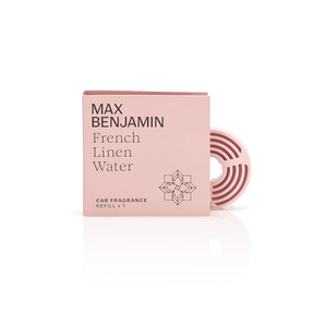 A pink Max Benjamin Car Fragrance Refill, a natural car air freshener with a circular vent clip partly visible behind the packaging, shown against a white background.