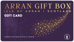 The Arran Gift Box e-Gift Card (Digital/E-card) for Isle of Arran gifts features gold text, swirling gold stars, and a stag logo in purple. Redeem online or in-store with instant email delivery.