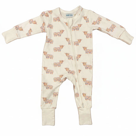 Baby onesie with highland cow pattern on a white background