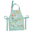 The ThreadBear Outer Space Apron is a light blue children's wipe-clean apron featuring rockets, planets, stars, and playful astronauts for fun, mess-free adventures. Perfect for little space explorers!.