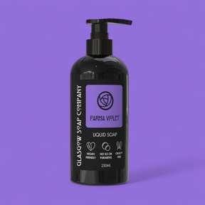A 250ml black bottle of Parma Violet Liquid Soap by Glasgow Soap Company with a pump dispenser, vegan friendly, cruelty free, and SLS- or paraben-free. The purple label highlights its eco-conscious packaging.