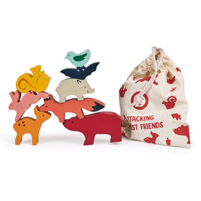 The Mentari Happy Stacking Forest is a plastic-free wooden animal stacker set made from sustainably sourced rubber wood, featuring colorful animal figures and a drawstring bag with red animal illustrations and "stacking forest friends" text.