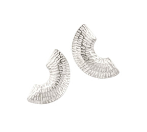 Caitlin Hegney Gibbous Small Silver Studs—crescent-shaped, textured silver earrings inspired by the ancient beauty of Kilmartin Glen, handcrafted in Scotland and displayed side by side on a white background.
