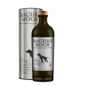 A bottle of Arran Machrie Moor Cask Strength Whisky 70cl stands before its matching box, both adorned with a black dog illustration and product details, showcasing this bold Isle of Arran single malt at 56.2% cask strength.